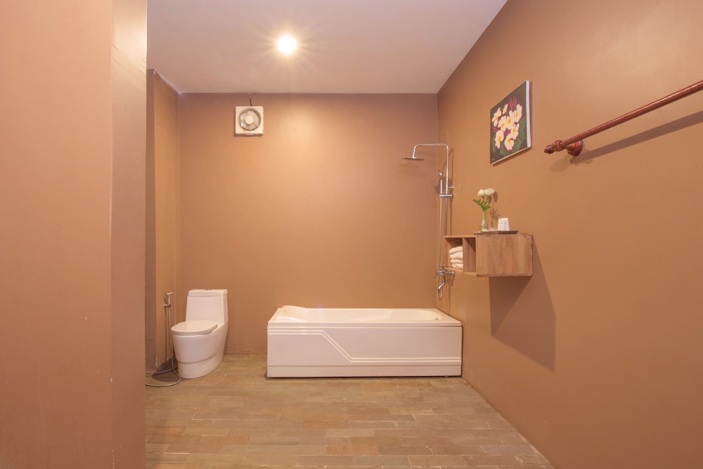 Deluxe Triple Room - Photo 17