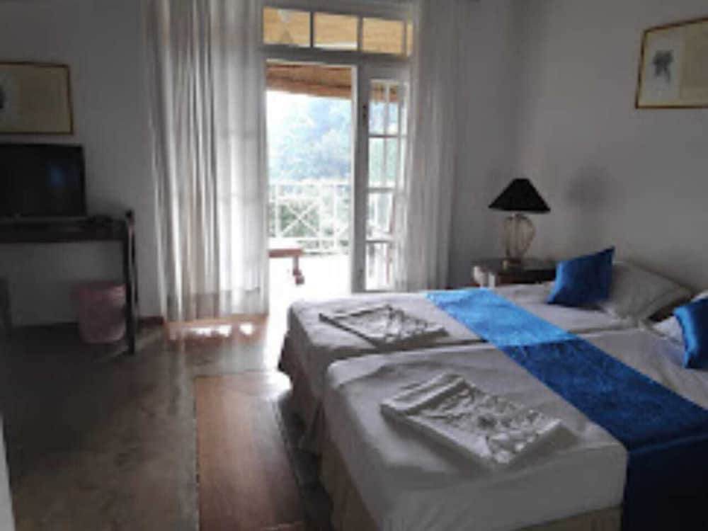 Deluxe Quadruple Room, Pool View photo 3