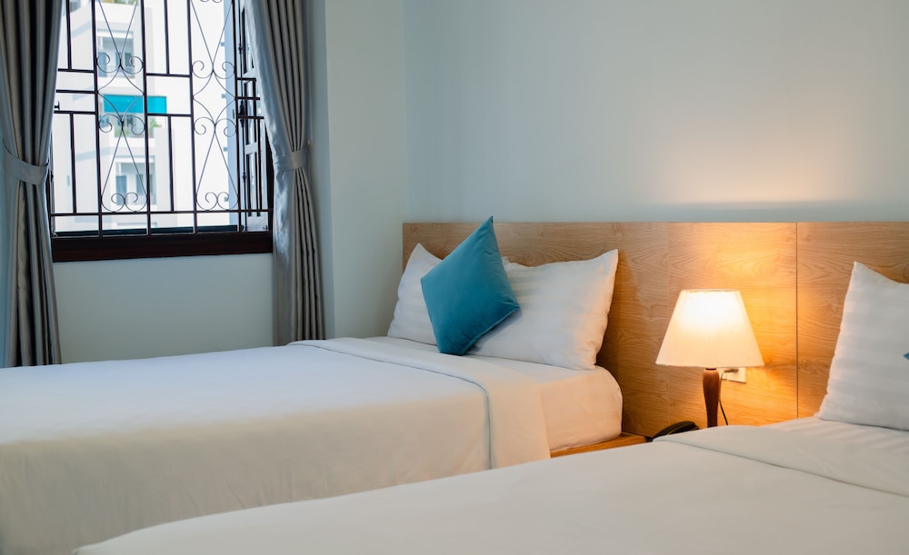 Deluxe Quadruple Room - Photo 8