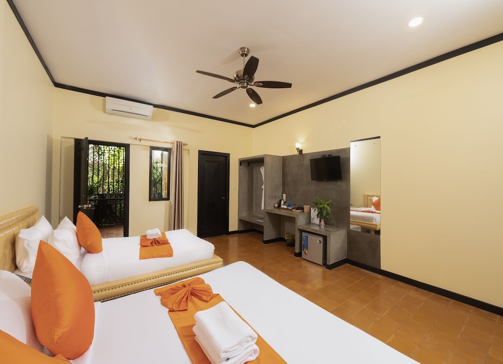 Deluxe Triple Room - Photo 8