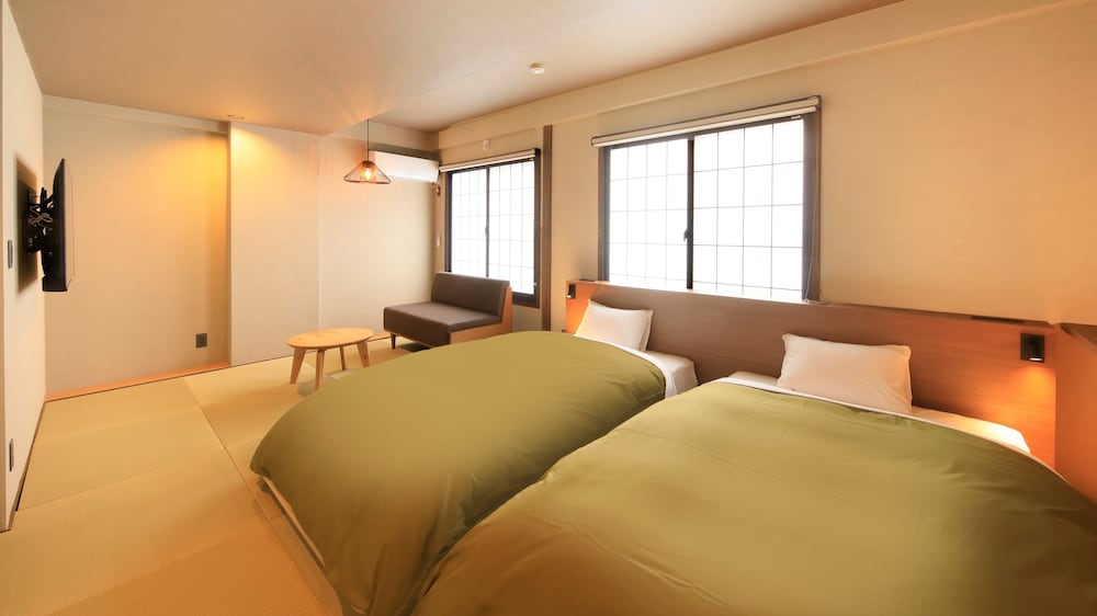 Twin Room - Photo 1