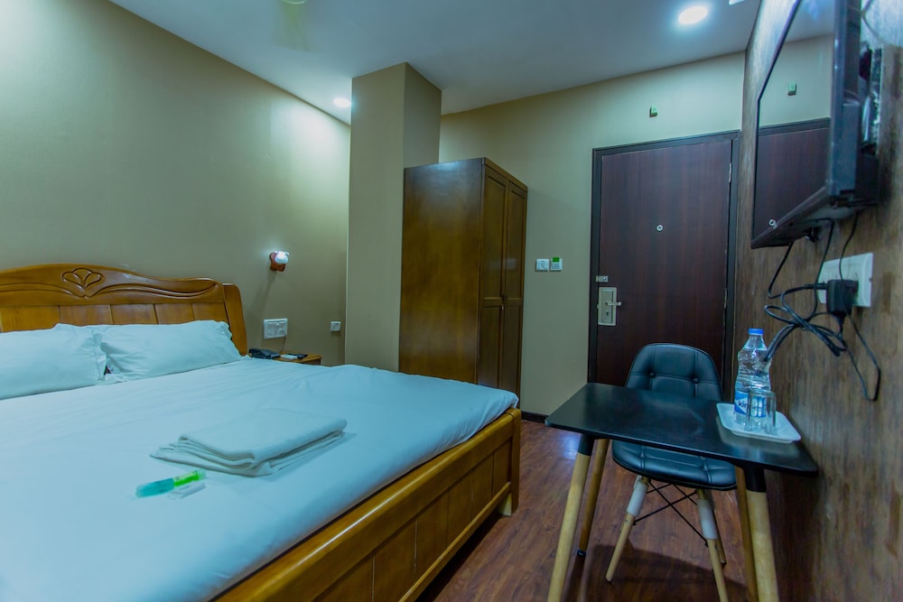 Deluxe King Bed Room - Photo 1