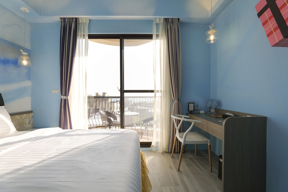 Signature Quadruple Room, 2 Double Beds, Ocean View photo 1