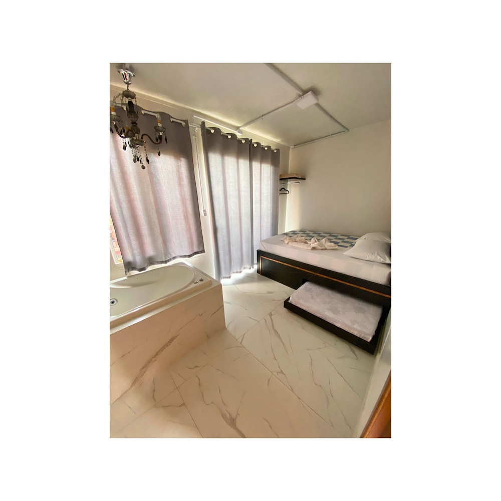 Quarto com Hidromassagem interna photo 1
