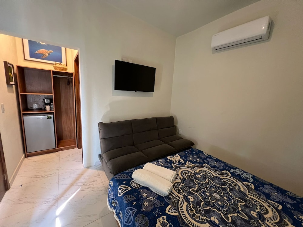 Comfort Double Room, 1 Queen Bed with Sofa bed, Refrigerator, Pool View photo 3