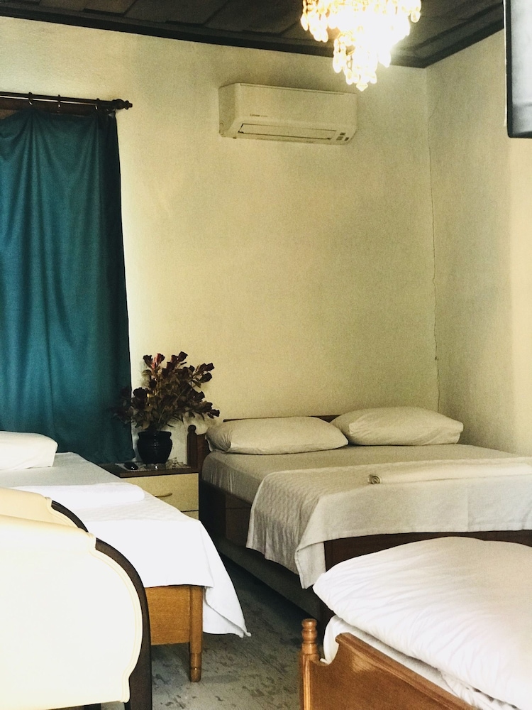 Family Quadruple Room, 4 Bedrooms, Private Bathroom, Garden Area photo 3