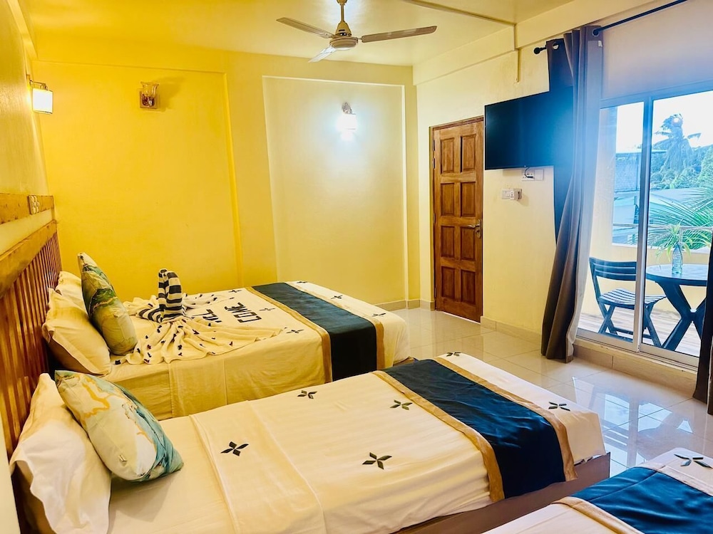 Deluxe Triple Room