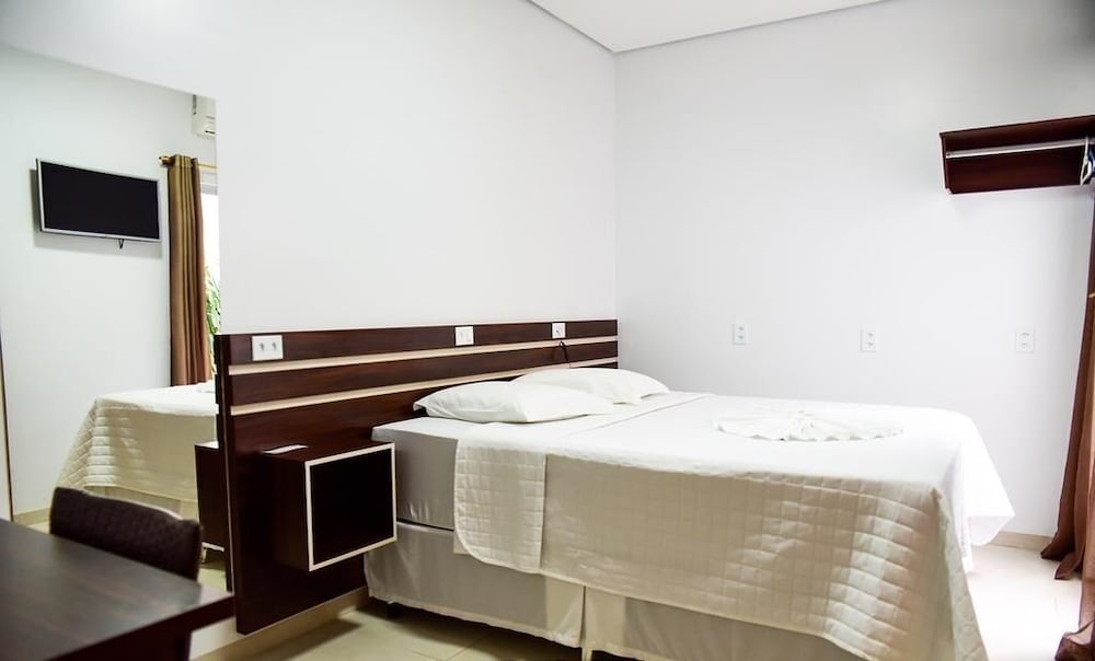 Triple Room (Piso Baixo Sem Frigobar) photo 3
