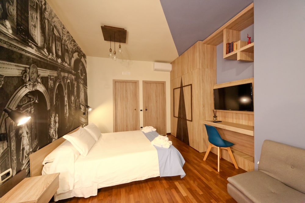 Exclusive Quadruple Room, 1 King Bed with Sofa bed photo 1