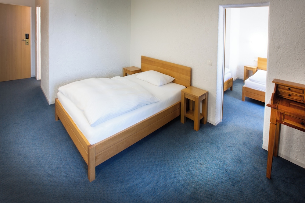 4 Personenzimmer photo 1