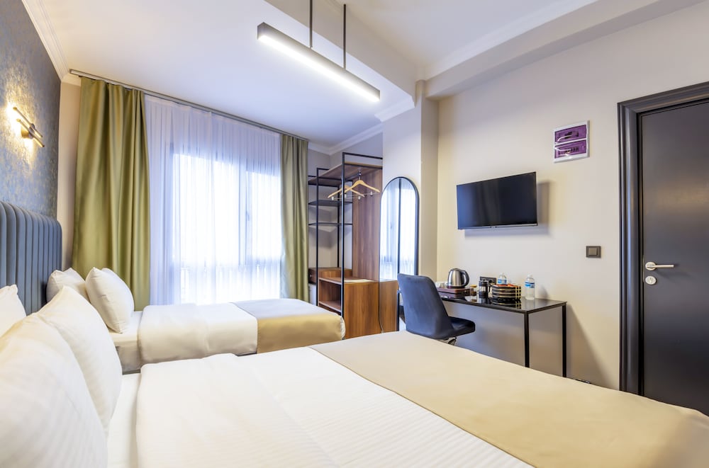 Deluxe Triple Room - Photo 4