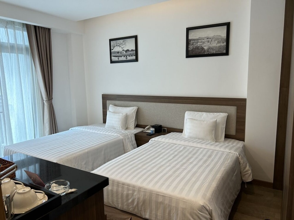 Deluxe Room - Photo 2