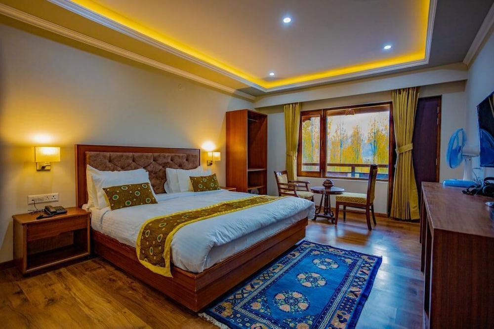 Deluxe Room - Photo 1