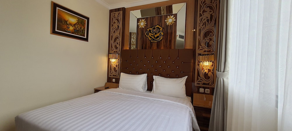 Deluxe Room - Photo 5
