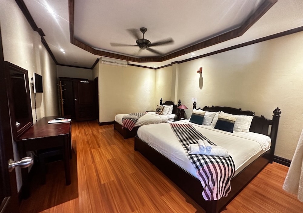 Deluxe Triple Room - Photo 19