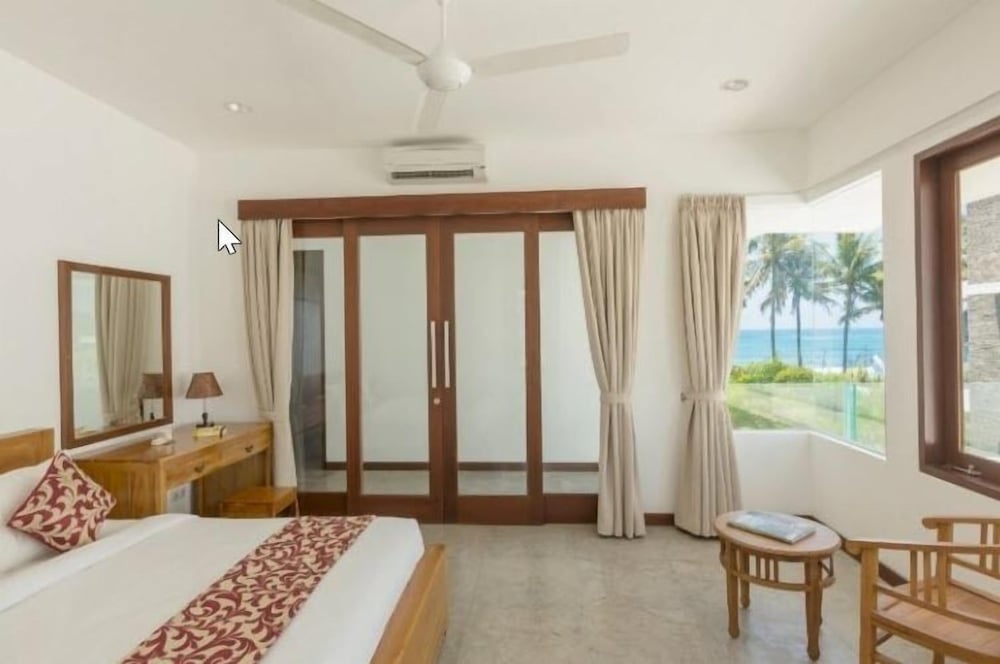 Three Bedroom Beachfront villa # 2 photo 3