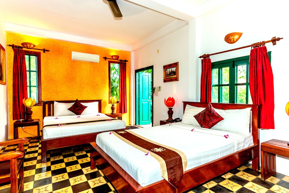 Deluxe Triple Room, 1 Bedroom, Garden View, Garden Area photo 2