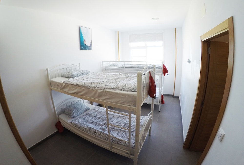 Bed In Shared Dormitory, Private Bathroom (4 Pax) - Sea View