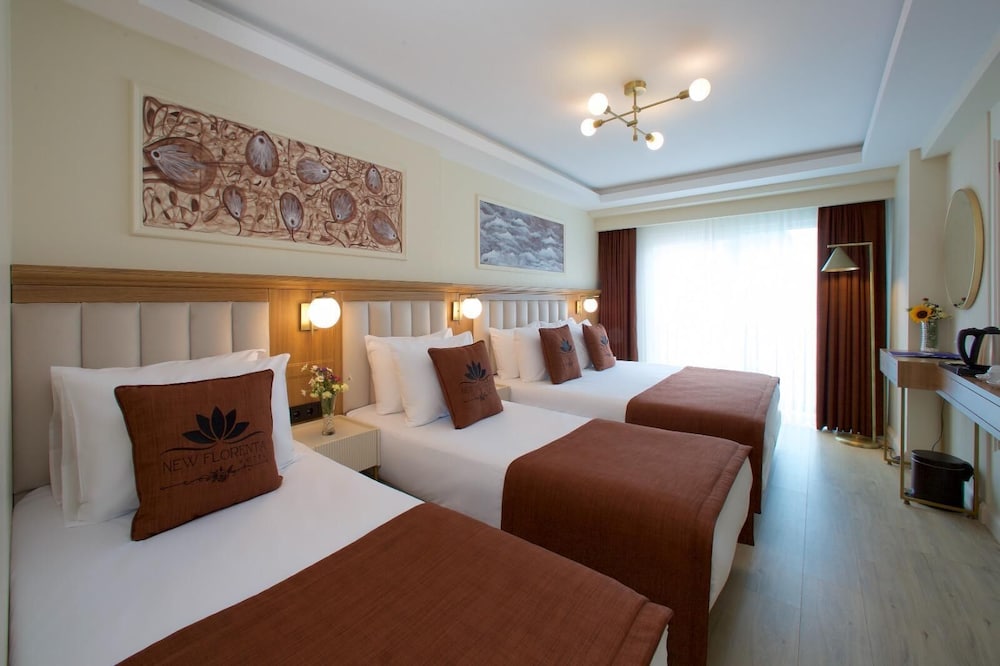 Deluxe Quadruple Room, Multiple Beds photo 1