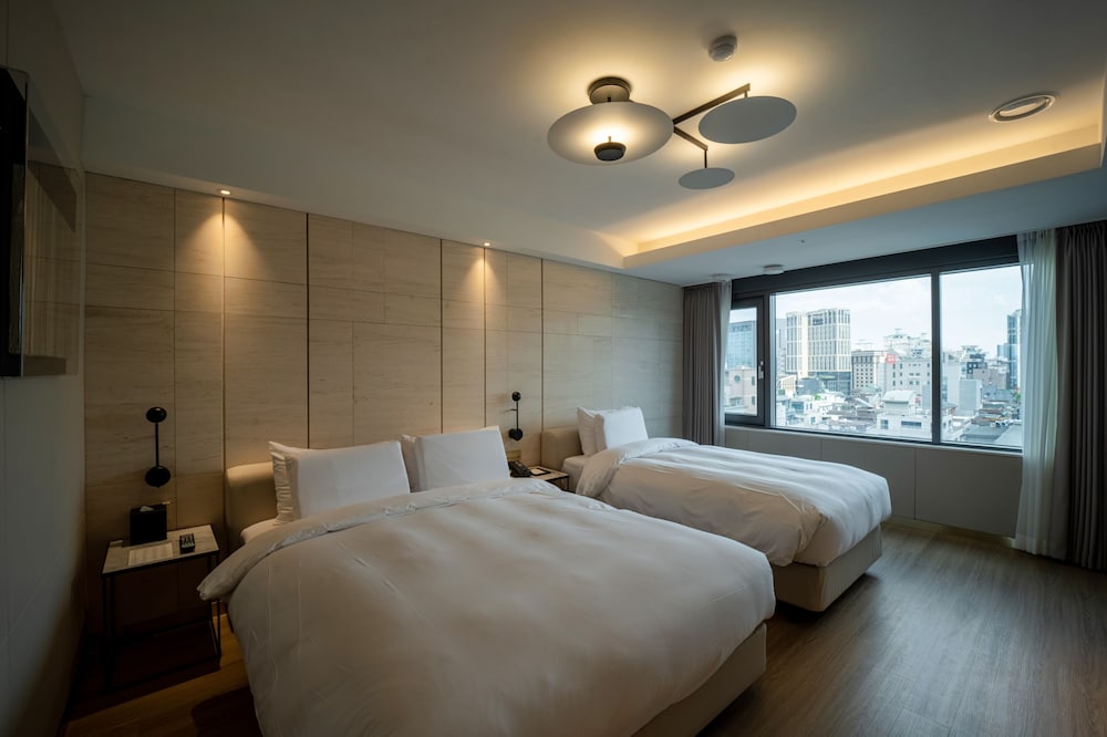Deluxe Family Twin Room - Photo 9