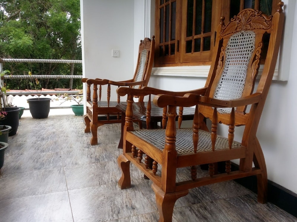 Deluxe Quadruple Room, 2 Queen Beds, Smoking, Garden View photo 2