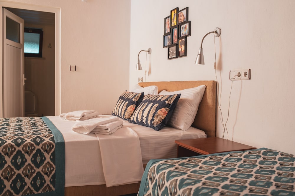 Family Triple Room, Garden View photo 3