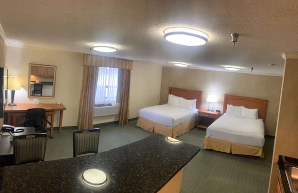 Suite, 2 Queen Beds, Non Smoking, Refrigerator & Microwave photo 1