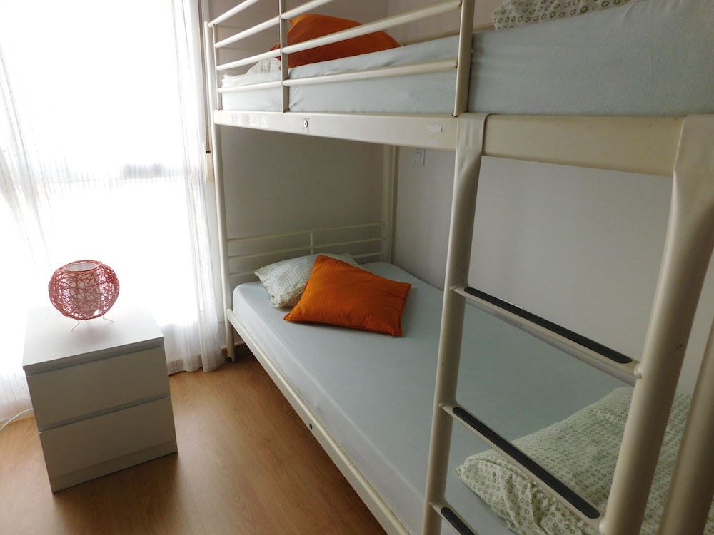 Una cama en la habitación Deluxe de cuatro camas