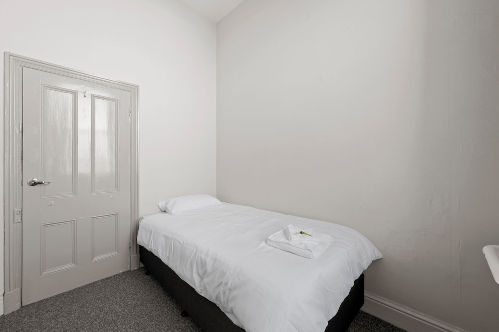 Basic Single Room, 1 Twin Bed, Shared Bathroom