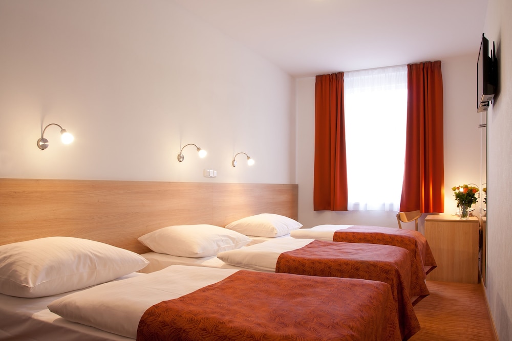 Standard Quadruple Room (Triple with Extra bed)