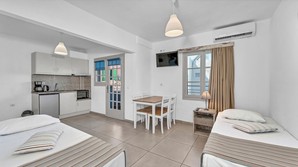 Junior Suite (Quadruple) Bedroom & Living Room