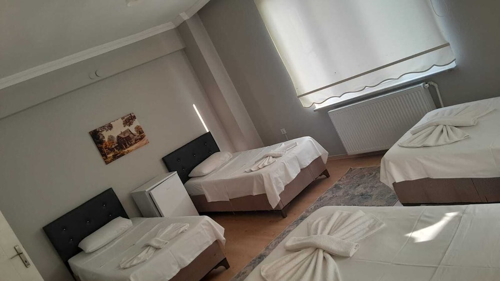 Deluxe Quadruple Room, Balcony, City View