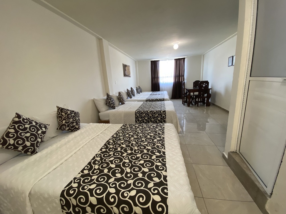 Basic Quadruple Room photo 3