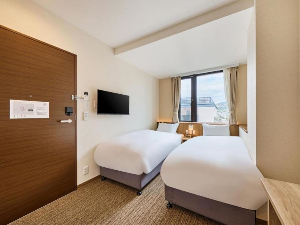 Standard Twin Room - Photo 1