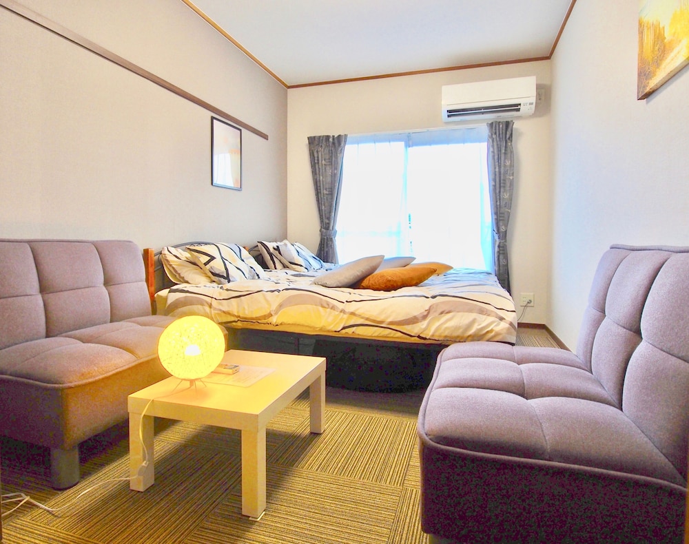 Western Style Room (2 single beds and a sofa bed) A
