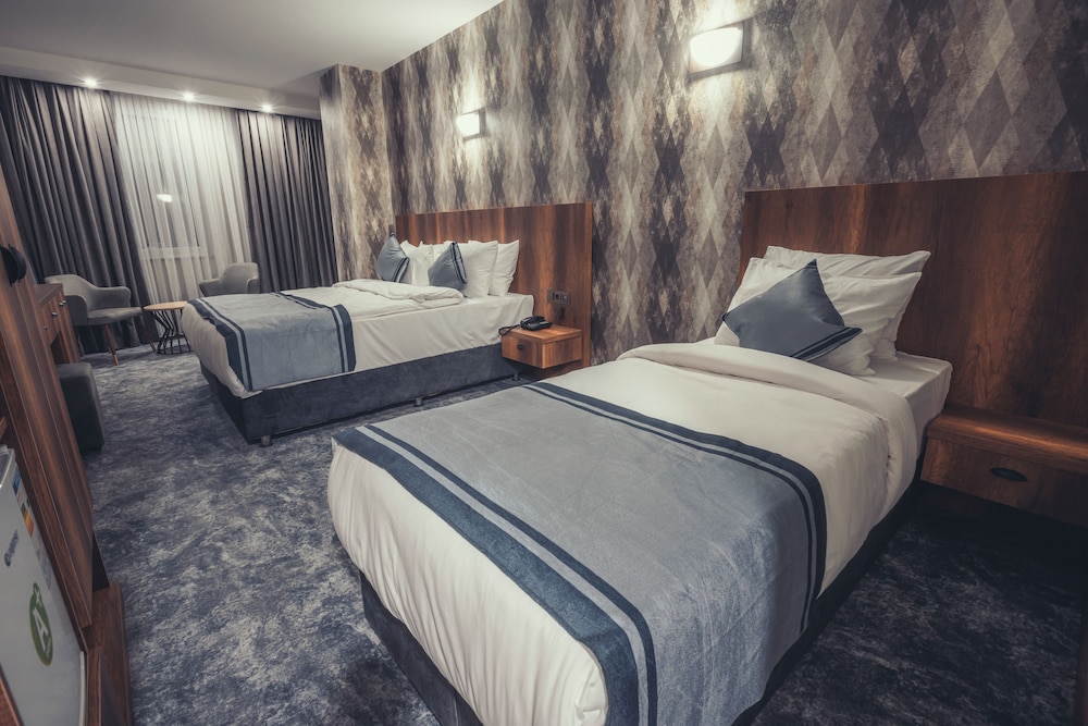 Deluxe Triple Room - Photo 7
