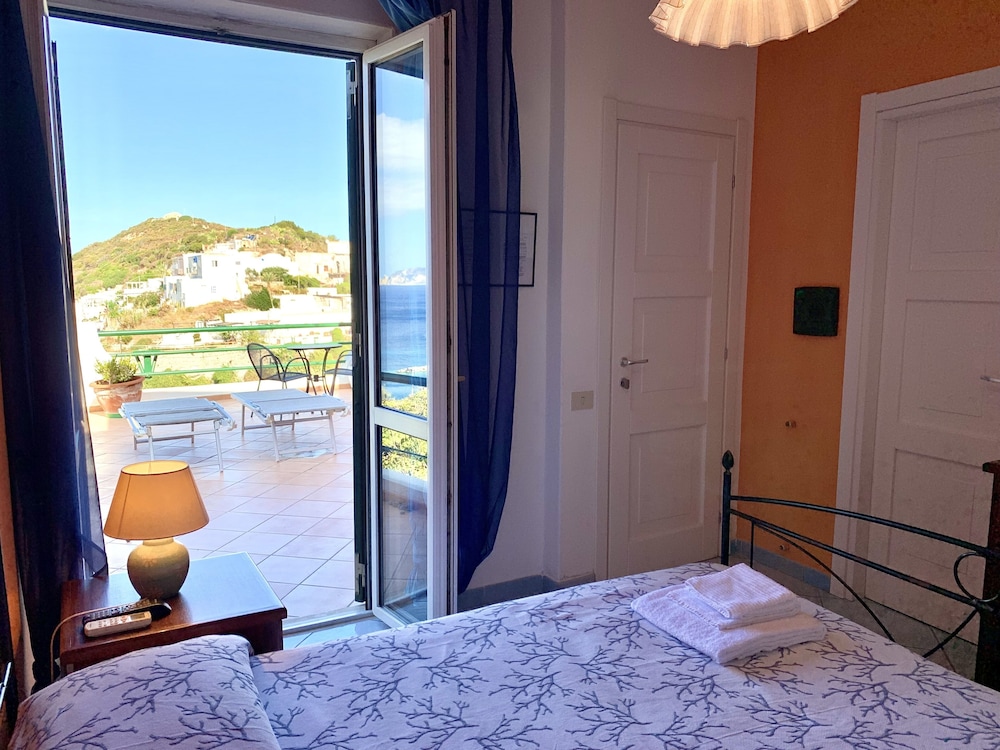 Family Quadruple Room, 2 Double Beds, Partial Sea View