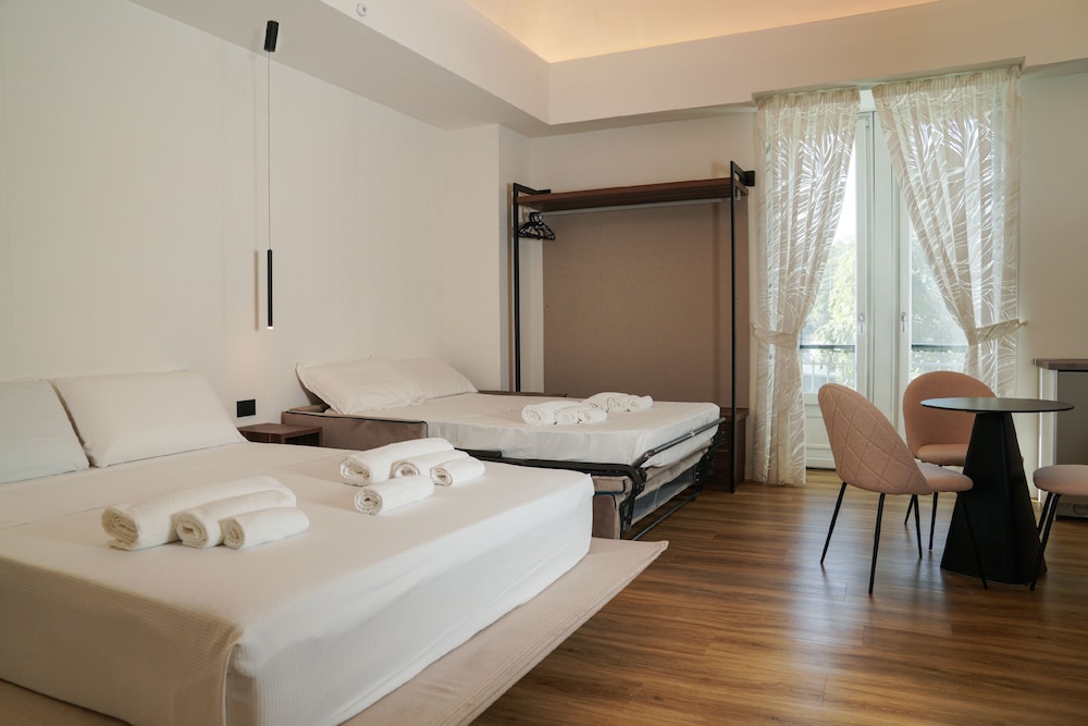 Deluxe Quadruple Room - Photo 4
