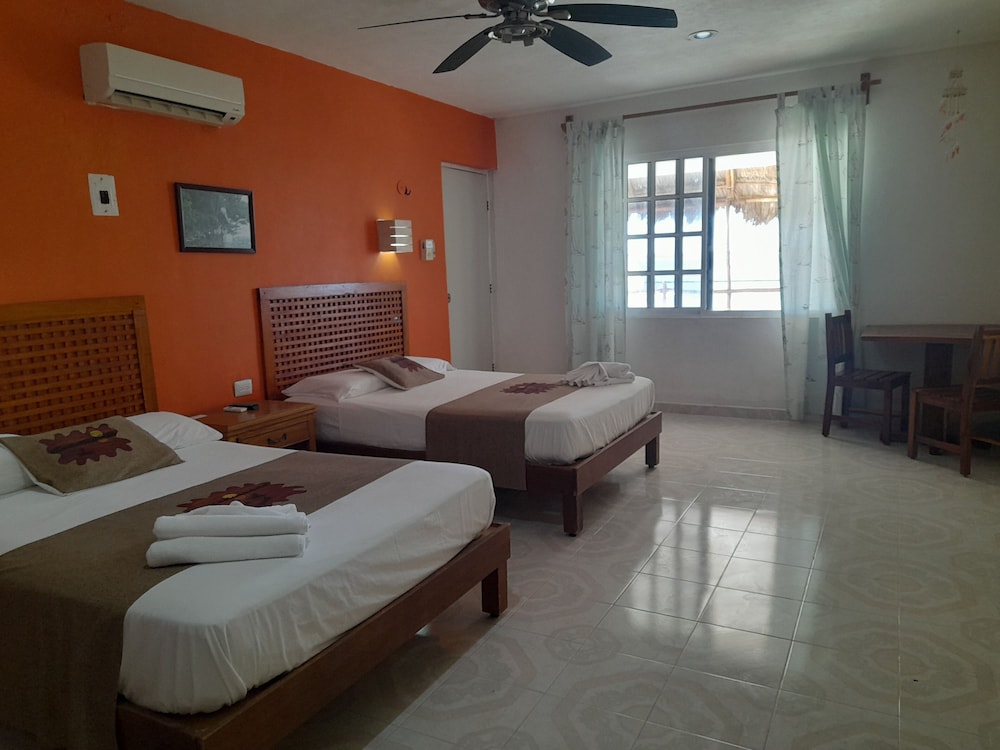 Grand Triple Room, 2 Double Beds, Beachside