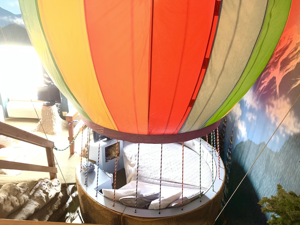 Up Up and Away, 1 Queen Bed ( Half Moon Shaped) (Main Floor)