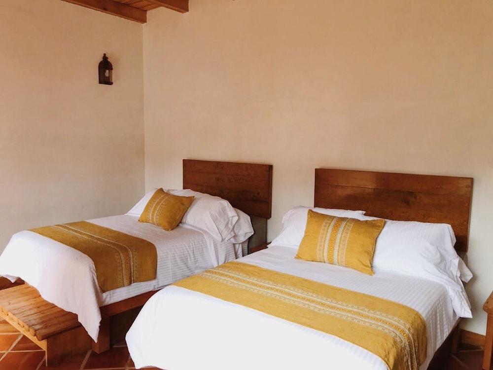 Deluxe Quadruple Room, 2 Double Beds, Garden View, Ground Floor photo 1