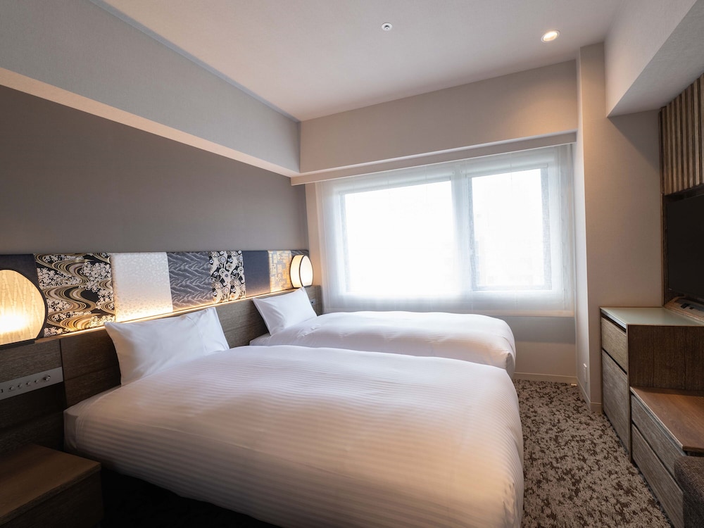 Twin Room (Free soft drinks, bread, and pastries), Non Smoking - Photo 1