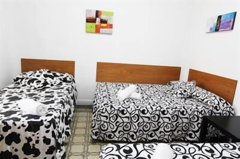 Habitación Cuádruple Básica con Baño Privado