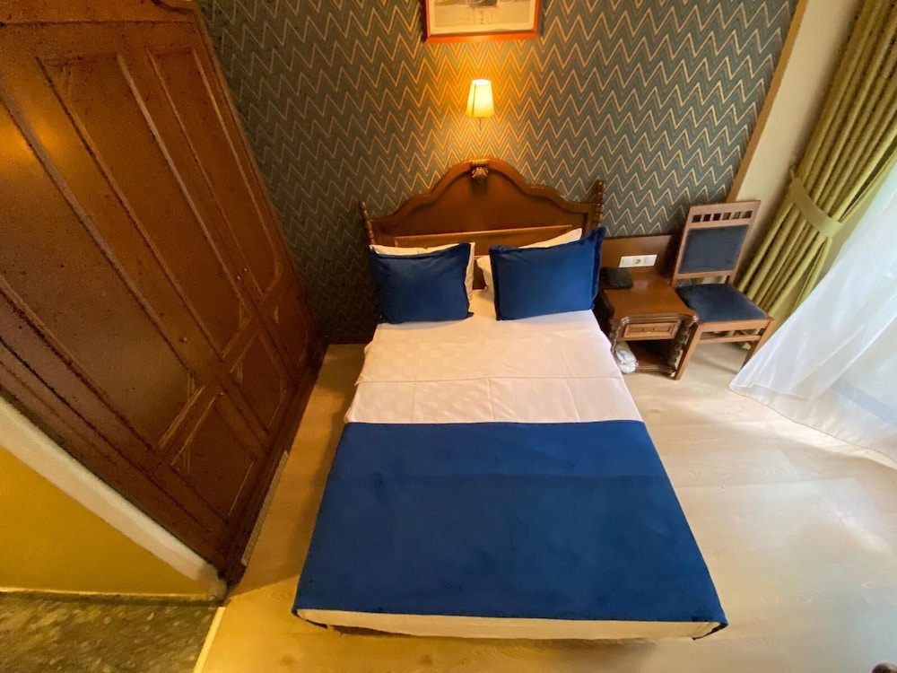 Classic Quadruple Room, City View photo 1