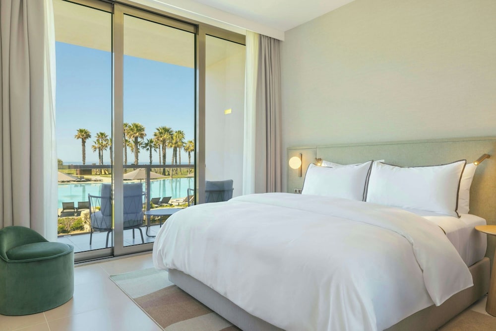 Deluxe Room, 1 King Bed, Balcony, Pool View - Photo 3
