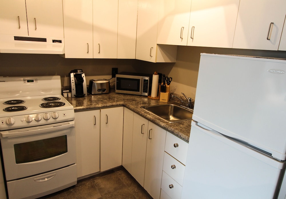 Luxury Quadruple Room, 2 Queen Beds, Kitchen, River View photo 3