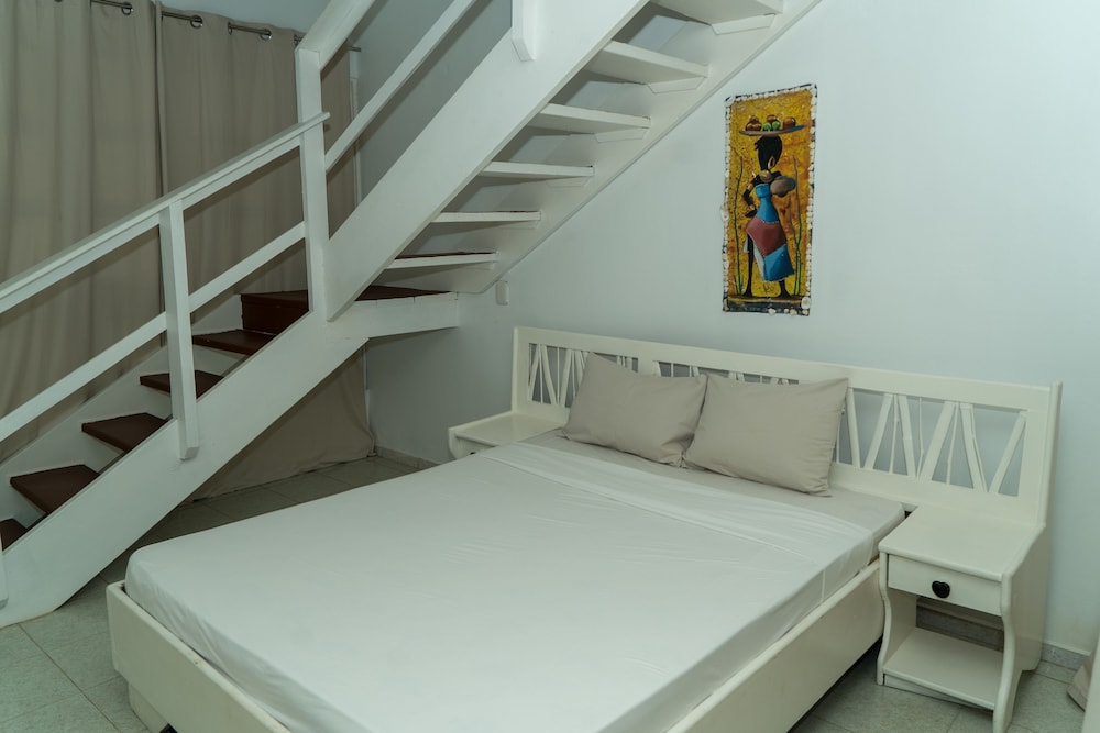 Standard Quadruple Room, 2 Queen Beds, Garden View, Beachfront photo 3