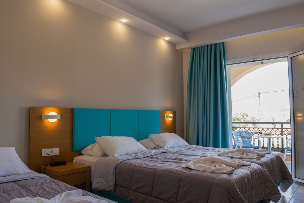 Superior Triple Room, Garden View, Garden Area - Photo 1