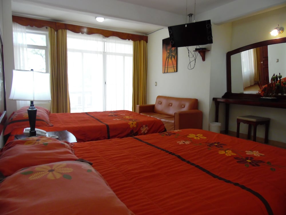 Standard Quadruple Room, 1 Bedroom, Partial Ocean View, Oceanfront photo 1