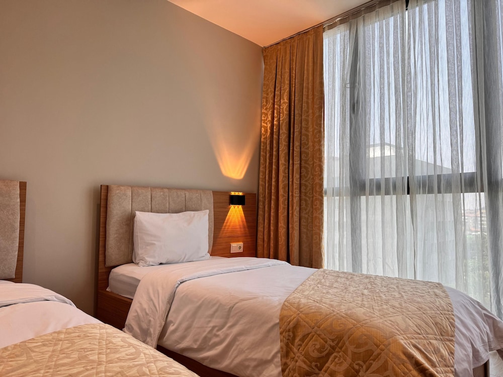 Standard Twin Room - Photo 4